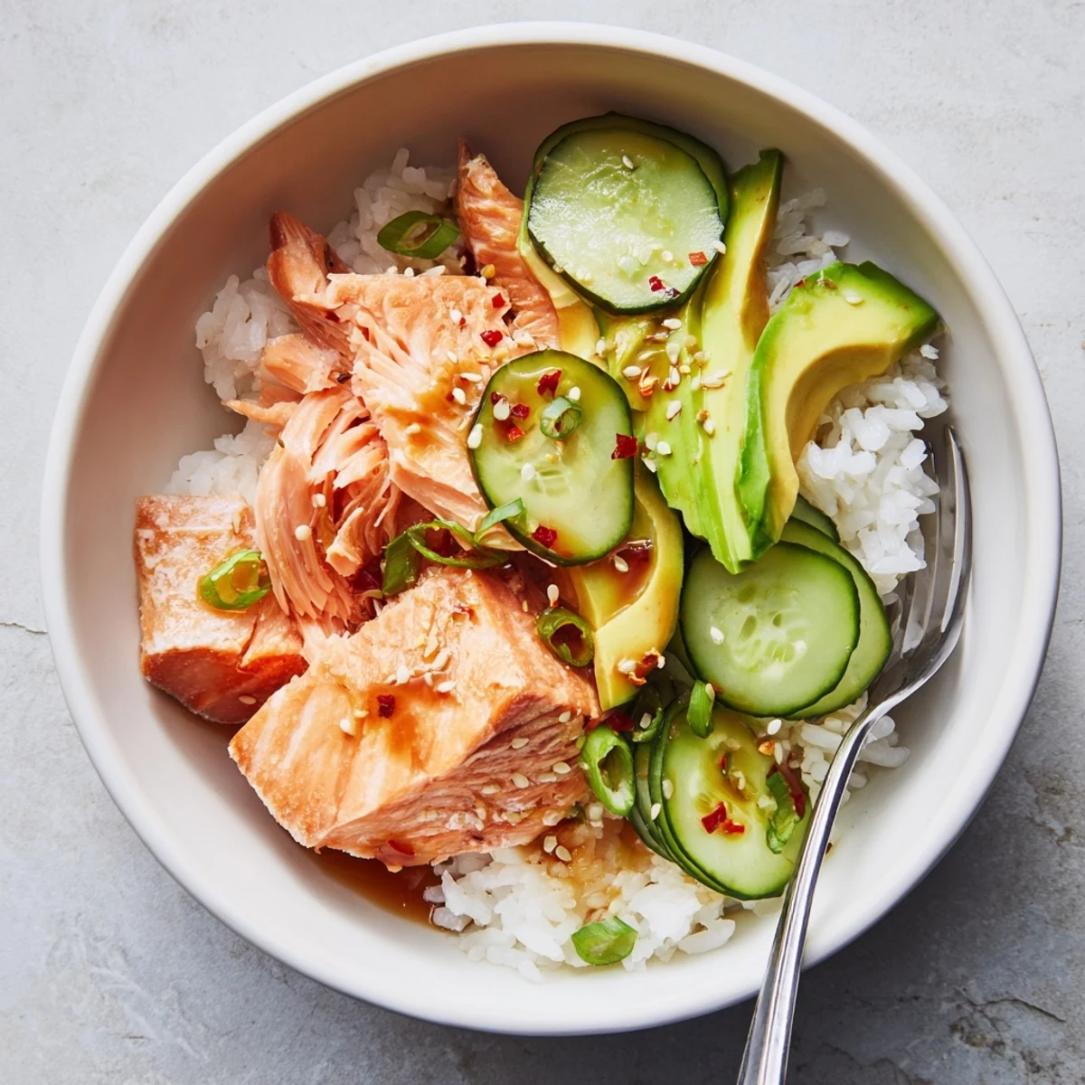 Quick and easy leftover salmon and rice bowl, perfect for a delightful meal.  