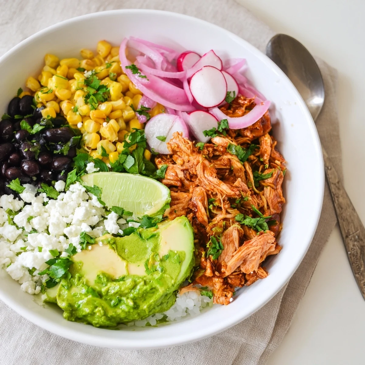Savory chicken and zesty green enchilada sauce in a hearty rice bowl.  