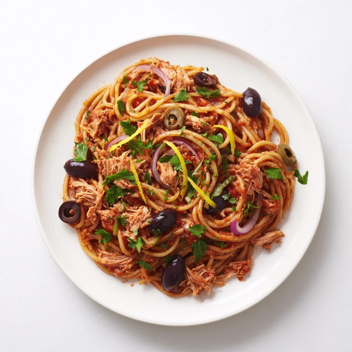 Pasta with Tuna, Olives & Capers: A close-up view of the flavorful finished pasta dish, ready to savor.