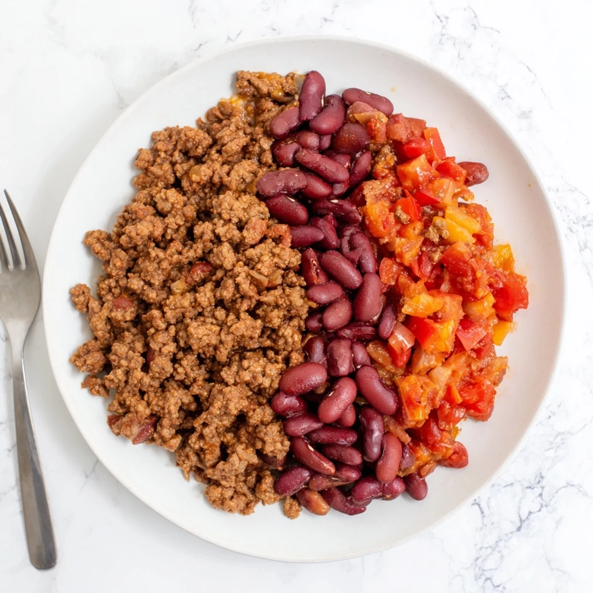 Juicy photo of The Secret 4-Ingredient Chili, ready with the rich aroma of slow-cooked deliciousness.