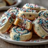 CRK-Inspired Pastel Swirl Birthday Cookies with vibrant, colorful swirls and festive sprinkles, perfect for celebrations.  